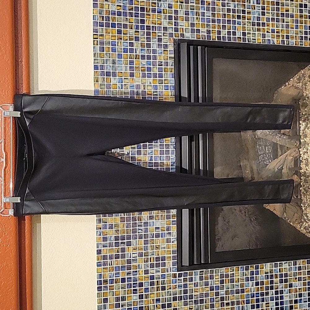 Trouve black leggings with faux leather trim. Size medium.